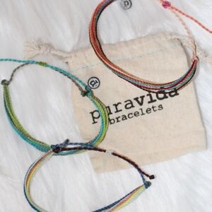 3 Pura  Vida multa color bracelets with bag. NWOT